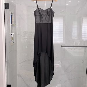 Black BCBGMaxazria LEANDRA dress in XS. Faux leather bodice. Worn once.